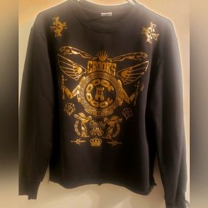 Woman's black & gold Crooks & castles crew neck